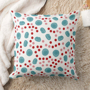 Coussin Motif à points bleus et rouges
