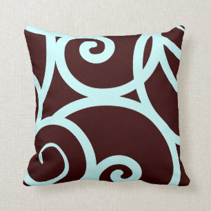 coussin motif abstrait turquoise et brun
