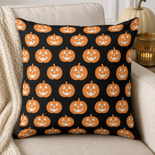 Coussin Motif classique de citrouille orange sur fond noir