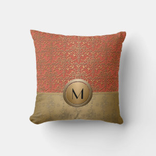 Coussin Motif damassé à monogramme corail et or