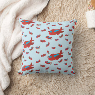 Coussin Motif d'avion rouge et bleu