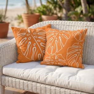 Coussin Motif de feuille tropicale blanche sur orange vif
