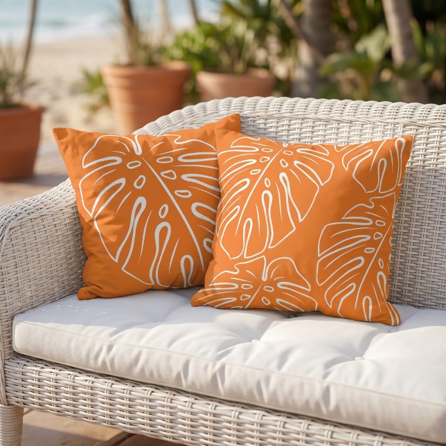 Coussin Motif de feuille tropicale blanche sur orange vif (Créateur téléchargé)