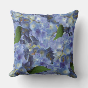 Coussin motif de fleurs en bleu