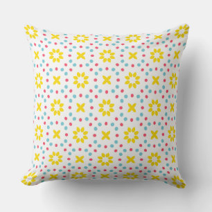 Coussin motif de fleurs jaunes et de points rouges et bleu