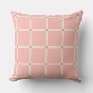 Coussin Motif de grille rose pâle avec accent de corail