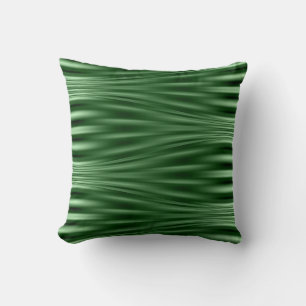 Coussin motif de vagues vert foncé sur l'oreiller