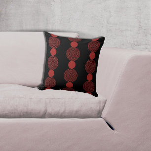 Coussin Motif en cercle rouge et noir