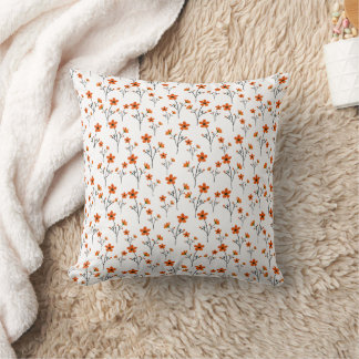 Coussin Motif fleur sauvage orange sur arrière - plan blan