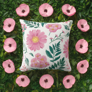 Coussin Motif floral rose vibre avec verdure luxuriante