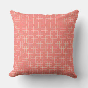 Coussin Motif Géométrique Élégant avec Fond Rose Corail