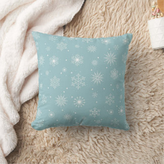 Coussin Motif Snowflake sur un arrière - plan bleu lancer