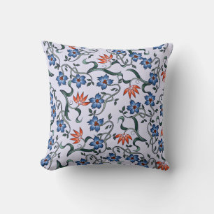 Coussin Motifs floraux bleus vibrants avec des vignes vert