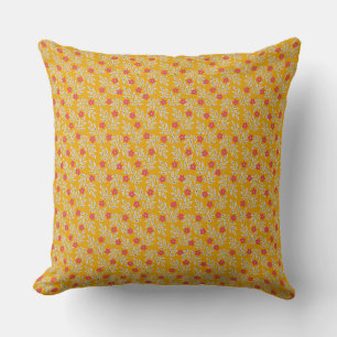 Coussin Motifs floraux vibrants sur fond orange vif