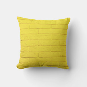 Coussin mur en brique jaune