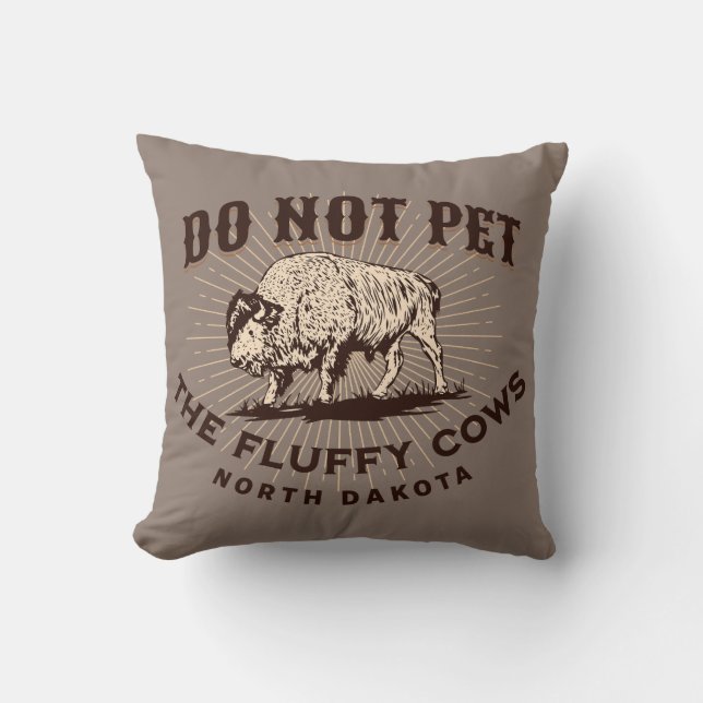 Coussin Ne touchez pas aux bisons aux airs de vaches du Da (Recto)