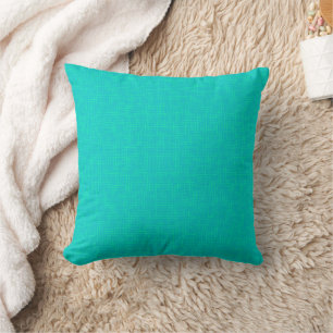 Coussin Néon turquoise texturé.