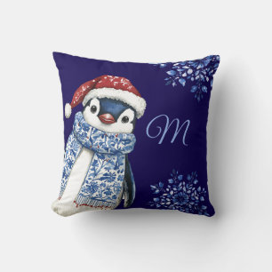 Coussin Noël du manchot de monogramme bleu