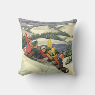 Coussin Noël vintage, enfants faisant de la luge sur une m