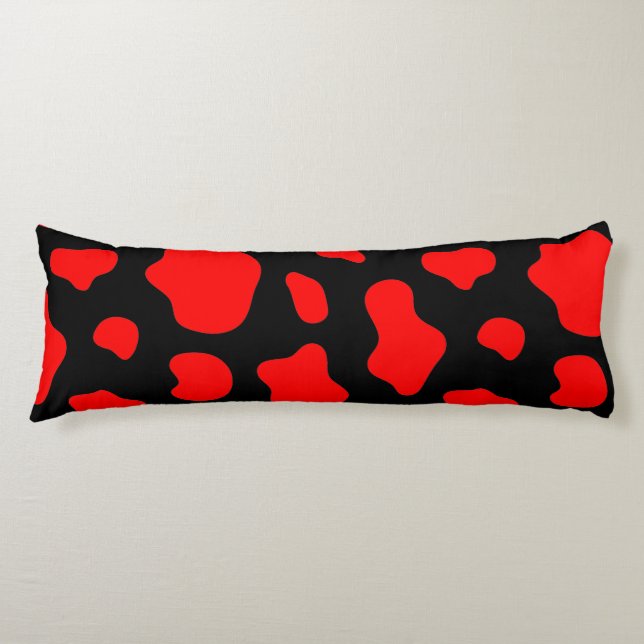 Coussin noir avec des taches rouges. (Devant)