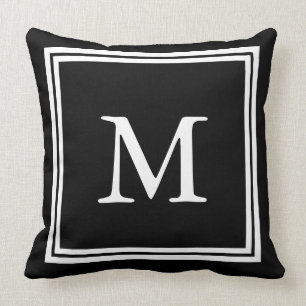 Coussin Noir classique avec le monogramme blanc de double