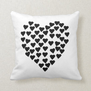 Coussin Noir de coeur de coeurs sur le blanc