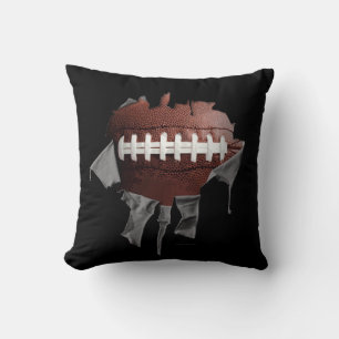 Coussin noir de football déchiré