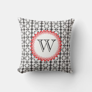 Coussin Noir et blanc avec cercle rouge et monogramme