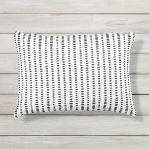 Coussin noir et blanc d'abrégé sur de motif