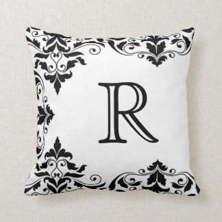 Coussin noir et blanc de damassé de monogramme