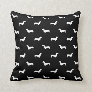 Coussin noir et blanc de motif de teckel