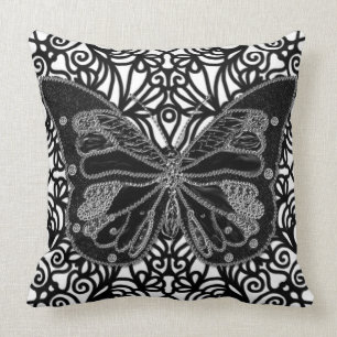 Coussin noir et blanc de papillon noir de remous