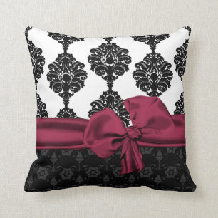 Coussin noir et blanc élégant d'arc de damassé 