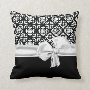 Coussin noir et blanc élégant de décorateur