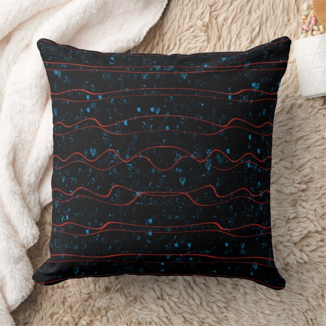 Coussin Noir et Bleu avec des Lignes Rouges Ondulées (Couverture)