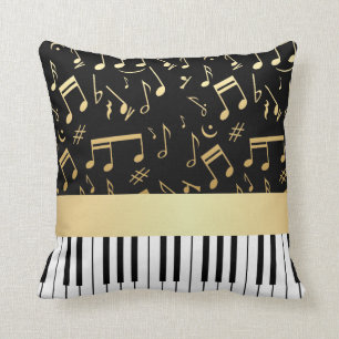 Coussin Noir et or de notes musicales et de clés de piano