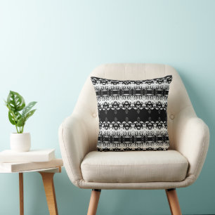 Coussin noir luxueux avec ornement