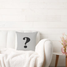 Noir "Quoi" sur fond gris clair