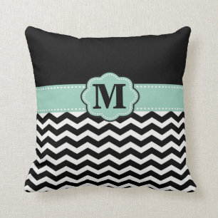 Coussin noir turquoise de monogramme de Chevron