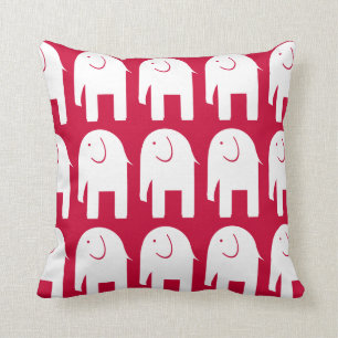 Coussin Objets superflus sur le rouge