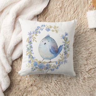 Coussin Oiseau bleu en couronne fleurie