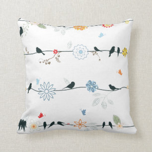 Coussin Oiseaux féminins sur un fil et des fleurs