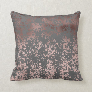 Coussin or rose de faux élégant et traçages gris