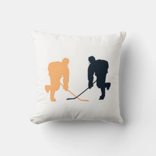 COUSSIN ORANGE ET HOCKEY NOIR