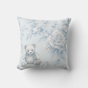 Coussin ours en peluche avec roses bleus