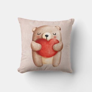 Coussin Ours en peluche mignon portant un coeur rouge