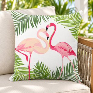 Coussin Paire de flamants roses tropicaux sur une fronde d