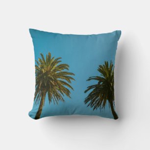 Coussin Palmier vert sous ciel bleu le matin