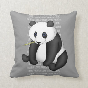 Coussin Panda mangeant le bambou