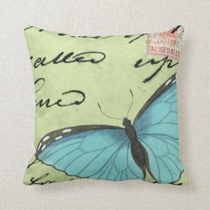 Coussin Papillon à ailes bleues sur carte postale Turquois